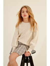 Pull en maille avec poignets volantés