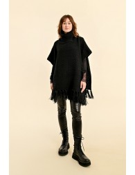 Turtleneck poncho with pompoms