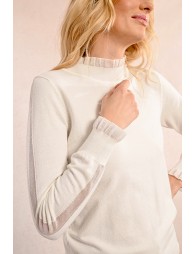 c sweater with high collar trimmed with ribbon