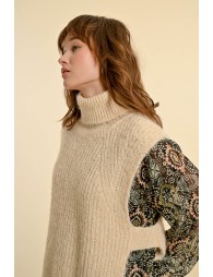 Sleeveless openwork sweater with turtleneck