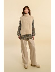 Sleeveless openwork sweater with turtleneck