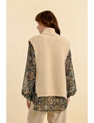 Sleeveless openwork sweater with turtleneck