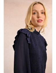 Ruffled blouse with smocked bust