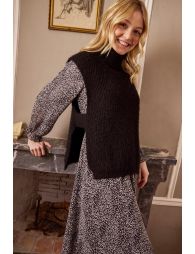 Sleeveless openwork sweater with turtleneck