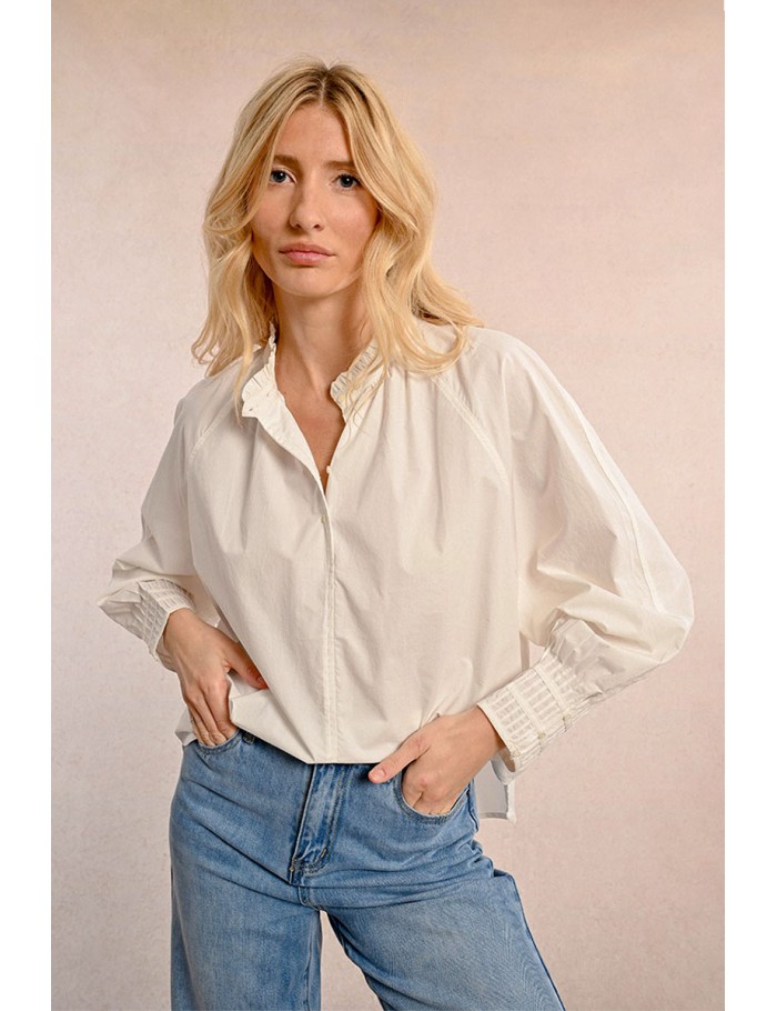 White pleated blouse