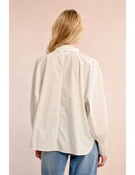 White pleated blouse