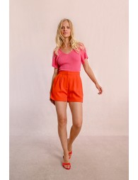 High-waisted pleated shorts