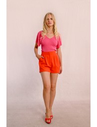 High-waisted pleated shorts