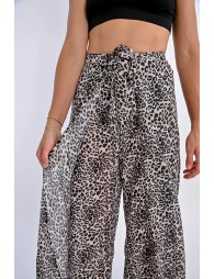 Pantalón largo con lazada y estampado